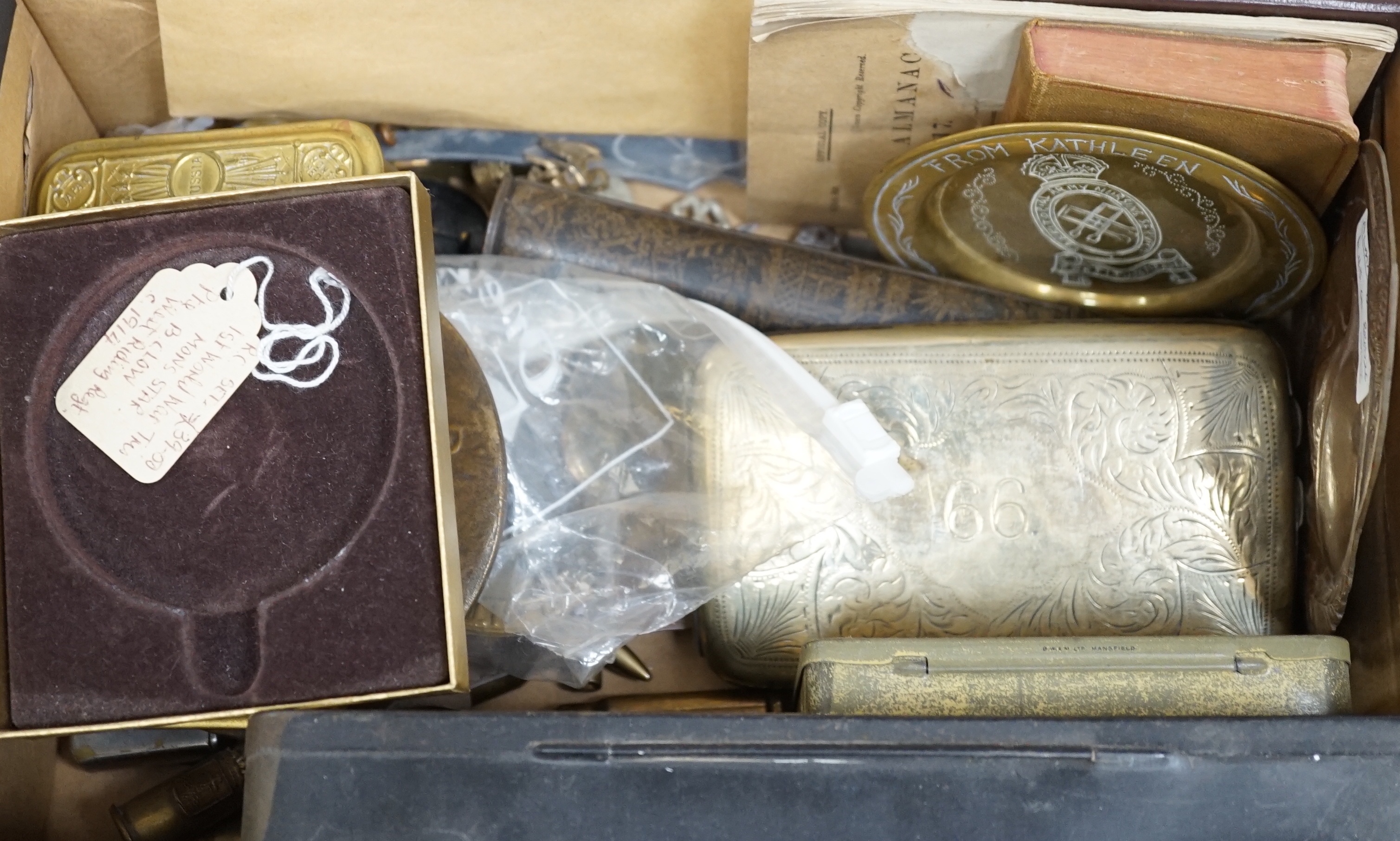 Two WWI medals, collection of cap badges and buttons, Queen Mary tobacco tin and a 66th Infantry Brigade concert party clickety clack cigarette case etc